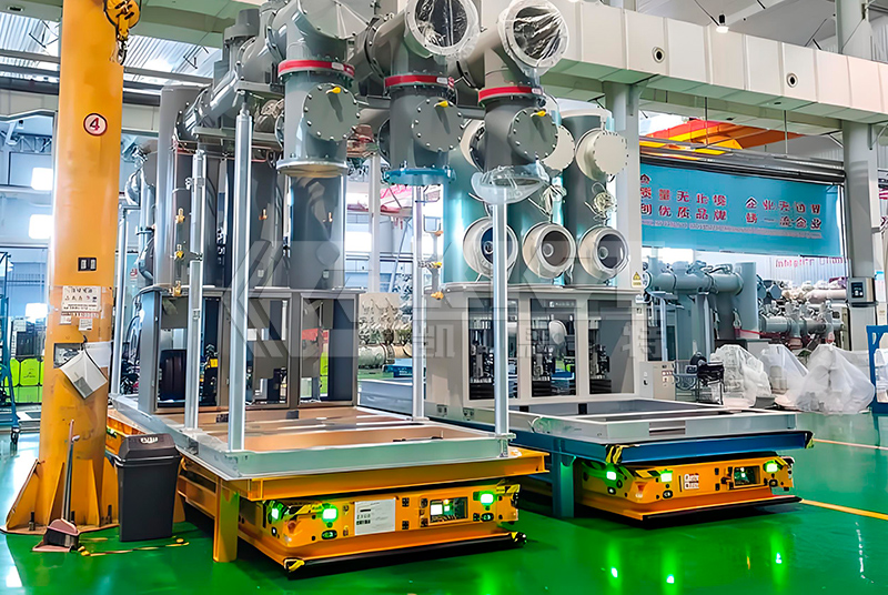 Intelligent heavy duty transfer vehicles are used for the transportation of high voltage electrical groups