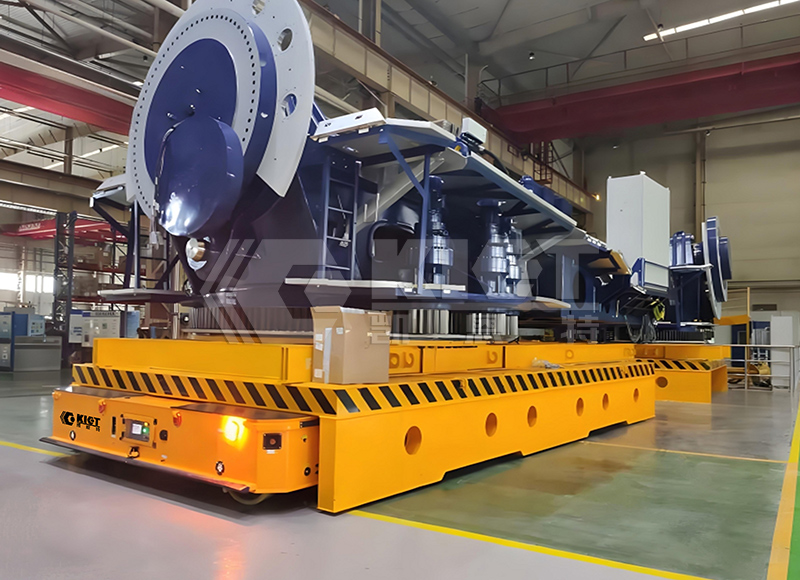 Intelligent heavy duty transfer vehicles are used for the transportation of wind turbine nacelle