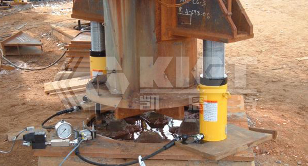 Coordinated Elevation of Heavy Steel Structures with Lock Nut Hydraulic Jacks